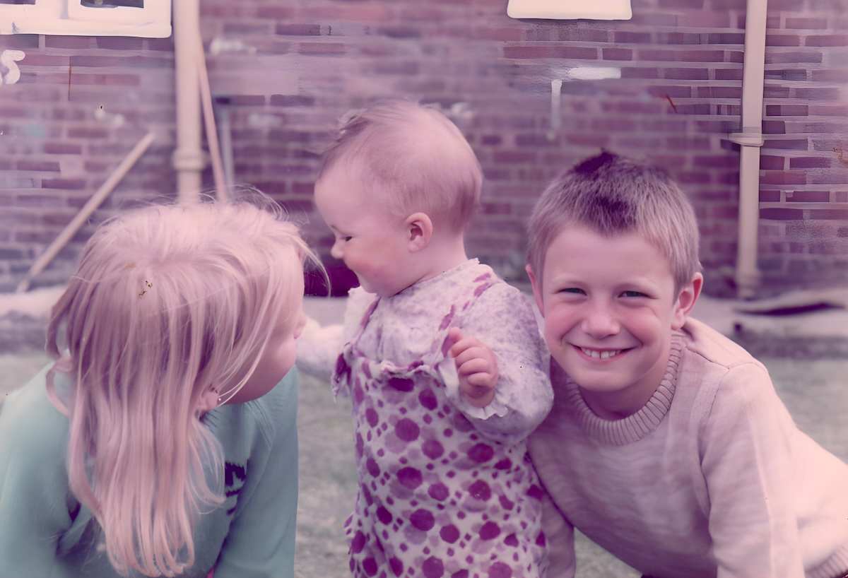 A 1970s family photograph before and after restoration